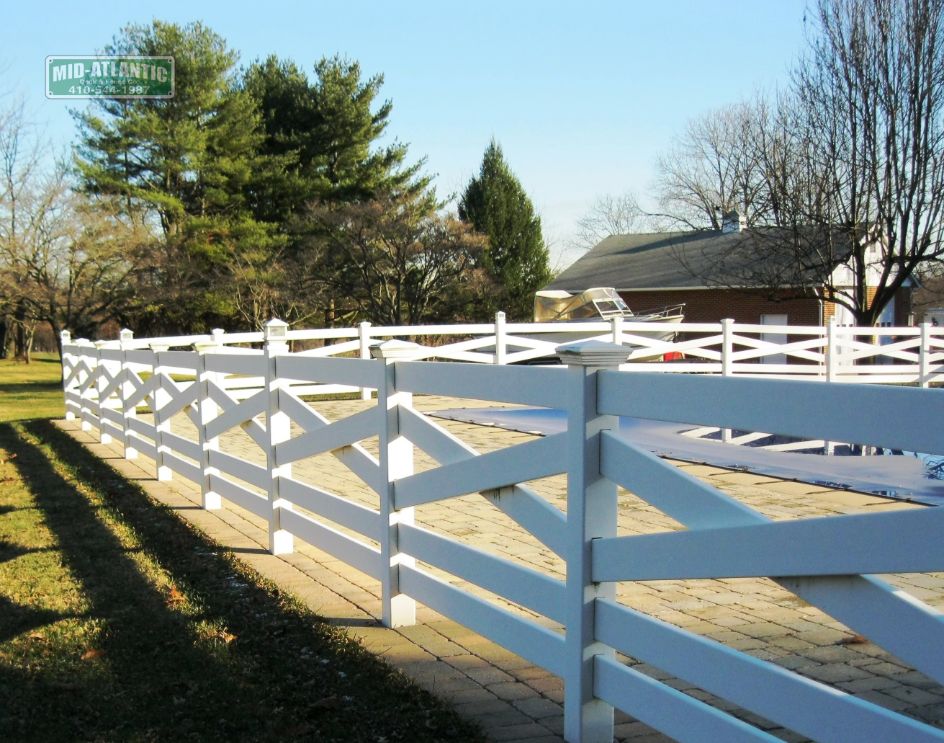 Check out this 5-rail white vinyl estate style fence. works well with this property in Annapolis Maryland.