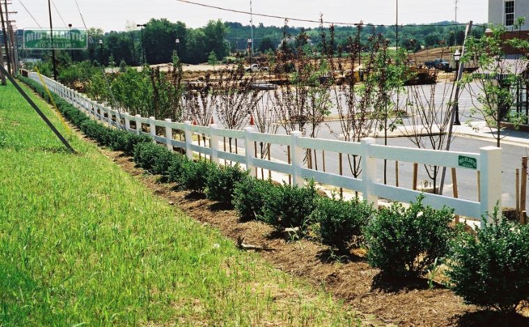 White vinyl 3 rail paddock style fence. Waugh Chapel village Gambrills Maryland.