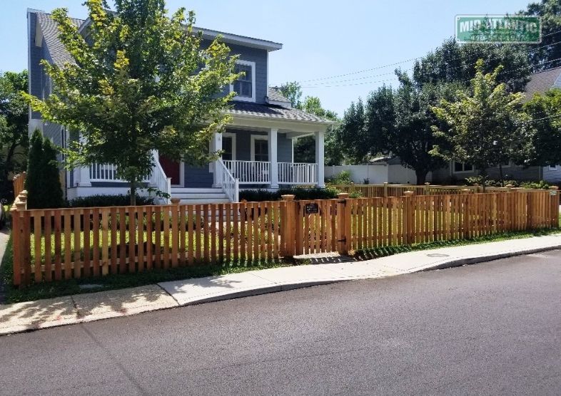 The next time you’re in Eastport, make sure you drive by this cedar flat top picket style fence with arched top picket gate. It’s a show piece.
