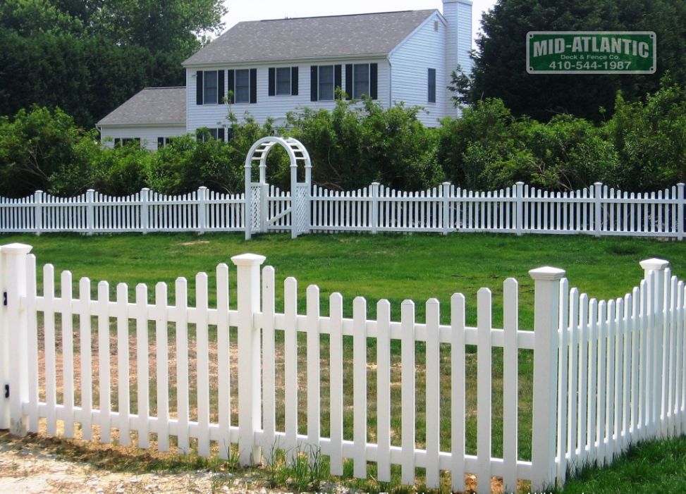 Mt Vernon picket 1 white vinyl picket fence. the picket spacing is approx. 3” apart with dog eared picket caps. Another project in Davidsonville Maryland.