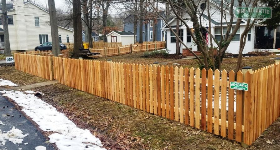 A cold winter day did not stop us from installing this pyramid pointed picket style fence. Yes, we install all year long.