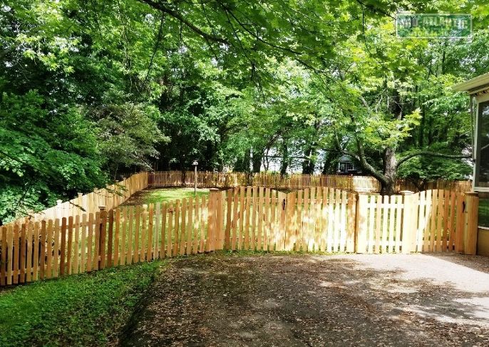 Dog Eared picket is what we installed at this home in Shipleys Choice, Millersville Maryland. The arched top double drive gate allows access for larger vehicle in to the back yard.