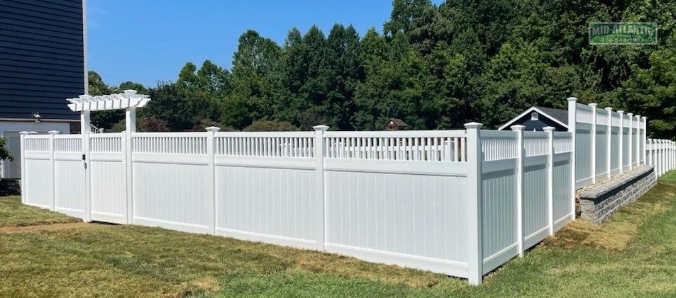 Have a pool and looking for some privacy. This customer in Lothian Maryland fenced in their entire yard with our white vinyl Stonington style. Notice the Trellis.