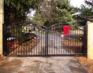 Arched accent gates for any driveway are a must.