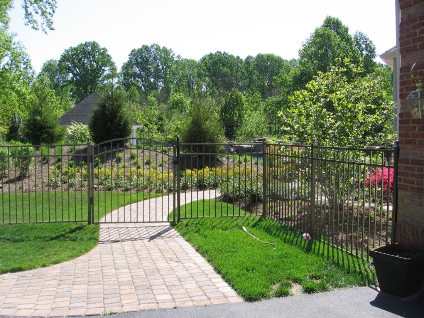 This all black 3-rail ornamental fence in bronze color makes the yard look finished. Bronze ornamental aluminum fence are a non-stocked color and can take longer to get.
