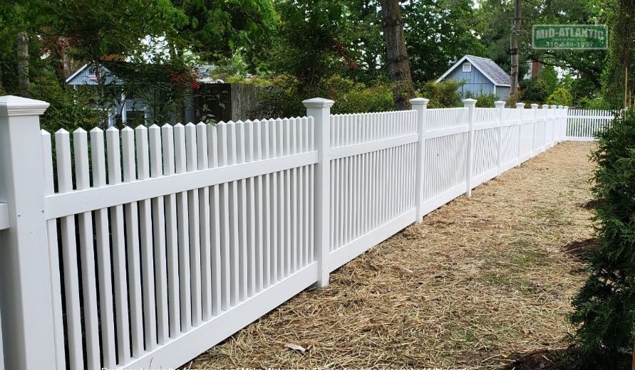 Another view of our Annapolitan style white vinyl picket fence in Annapolis Maryland.