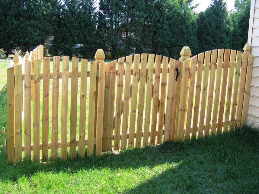 Another great fence. This is our Sunrise style picket fence. It goes great with customers who need to keep the fence close to the ground because it is stick built to fit your grade.