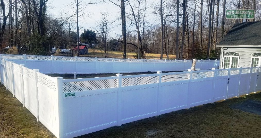Gotta have this one. It screams safety-security- privacy Our white vinyl privacy fence Chartridge style with tight weave privacy lattice is an excellent way to keep you kids and dogs safely in your yard.