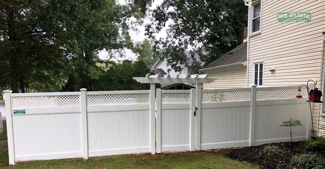 Our Chartridge white vinyl privacy fence with tight weave lattice is an excellent choice and also a great way to dress up the front of you home in Millersville Maryland.