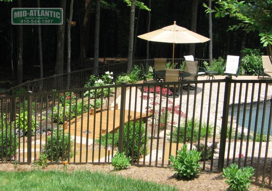 Here is another example of a 2- rail fence. this one is aluminum and was installed in Crownsville around a new pool.