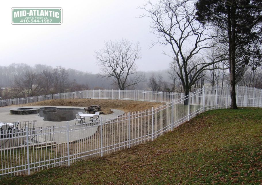 All in white on this foggy morning. Love the look of this white 3 rail ornamental aluminum fence that this customer used for this rolling hills property.
