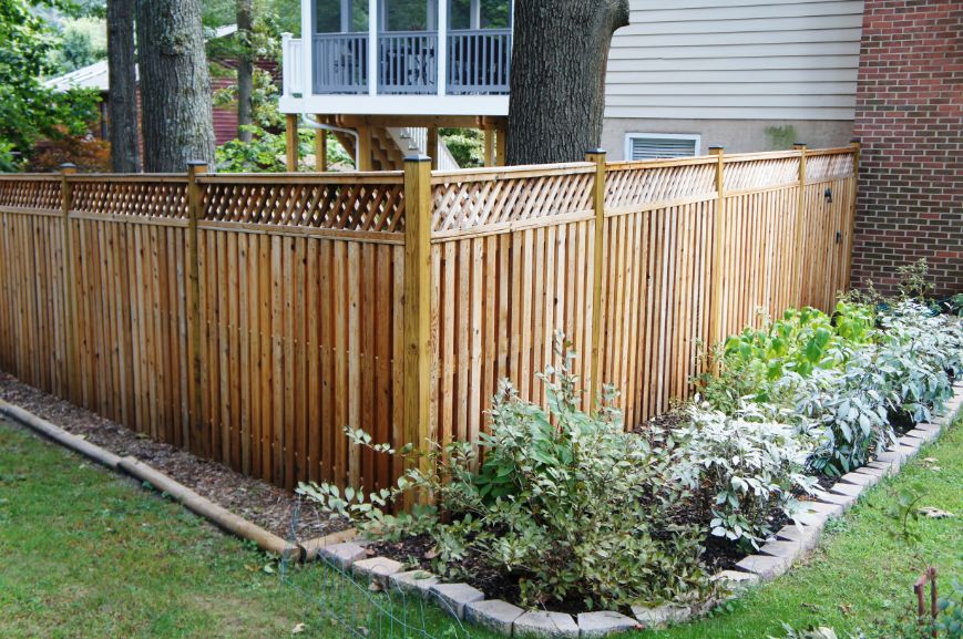 5+1 total fence height is 6’ tall. This is our Wyngate style privacy fence with diamond lattice top and standard post caps. Great choice for privacy and a nice back drop for the plants in Severna Park Maryland.