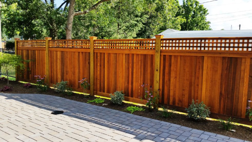 Manhattan Beach in Severna Park is where we built this cedar vertical board style privacy fence with square lattice top on 6x6 posts and federal style post caps.