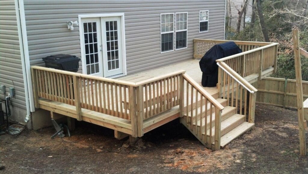 grill on a wood rectangular low elevation deck