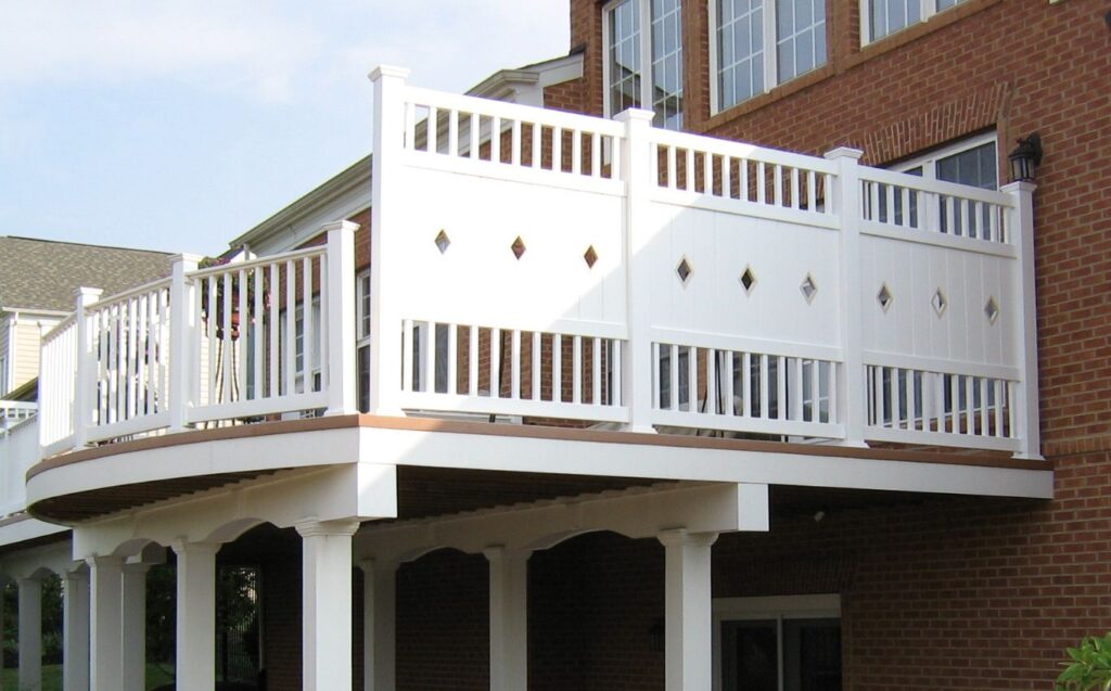 Barrel front, low maintenance vinyl railing and privacy screen. Decks in Columbia Maryland.