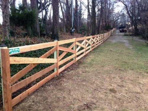 This community in Annapolis Maryland used this cedar 5-rail estate fence to define theaccess to their waterfront beach.